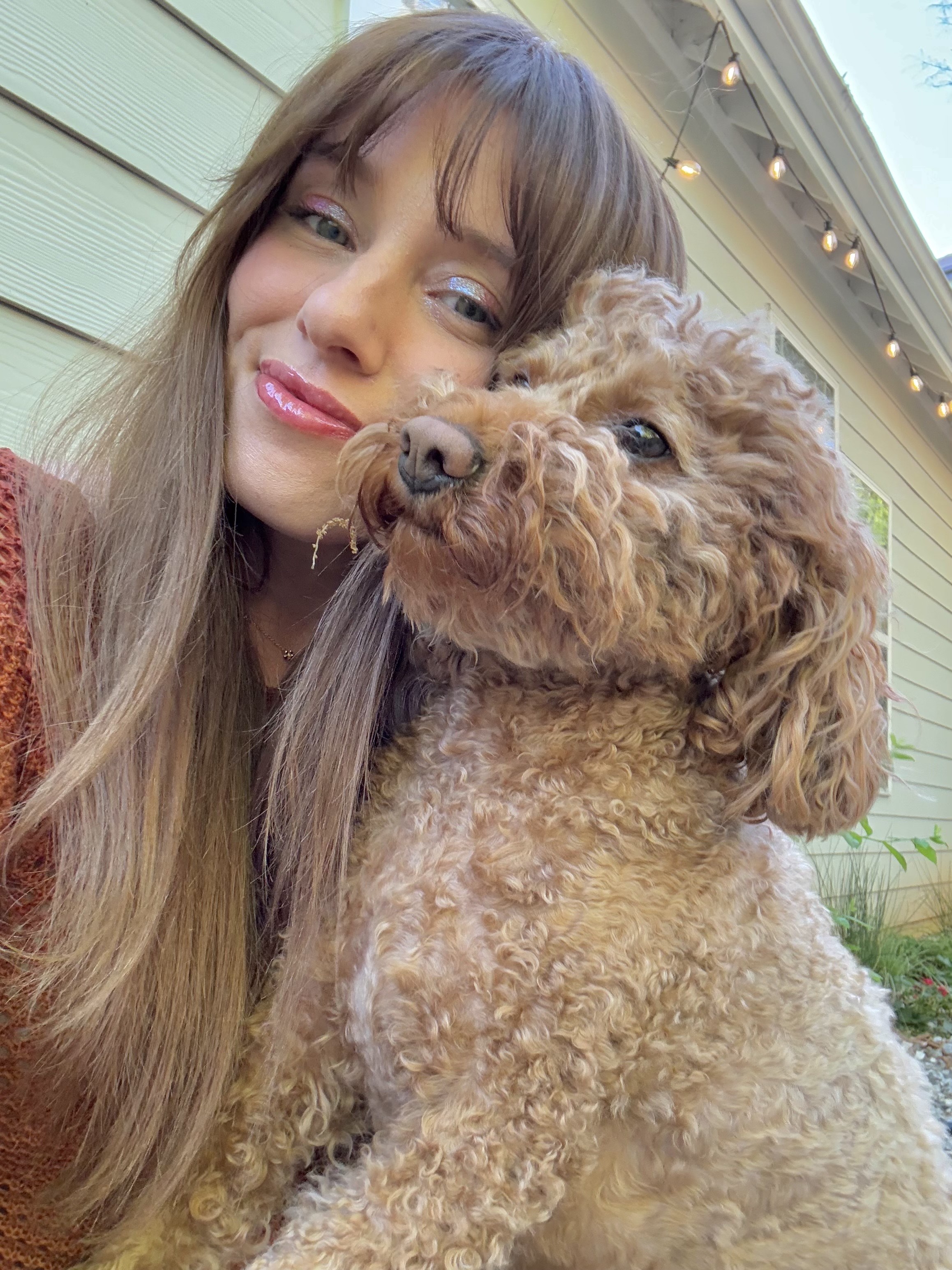 sammy with a small, brown dog